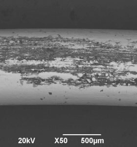 BSE image black defects on wire OCAS